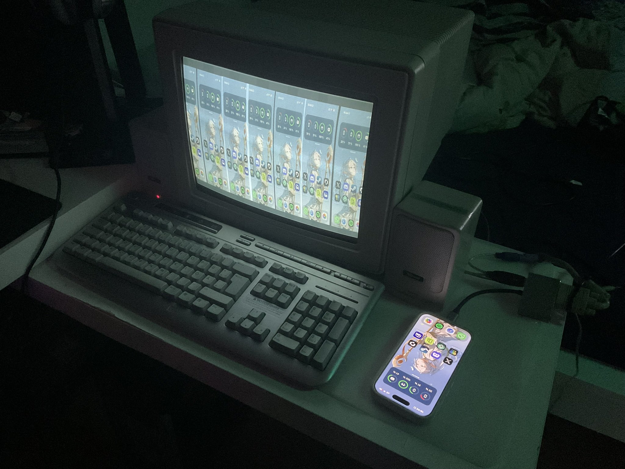 iPhone 17 connected to a CRT monitor